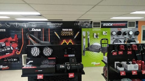 Product stand displays with vinyl applied to walls suit the desired customer layout and make amazing in-store advertising.