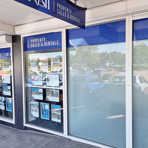 Building Signage for Rest Property - awning signs for the facade, frosted glass graphics for office privacy and print and cut vinyl decals for external glazing.