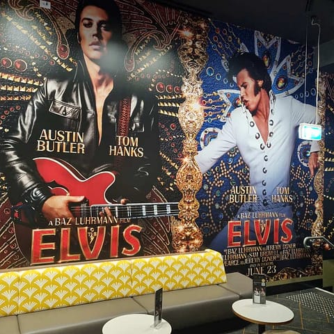 Elvis movie premiere - promotional wallpaper and ticket booth wrapped with vibrant printed vinyl