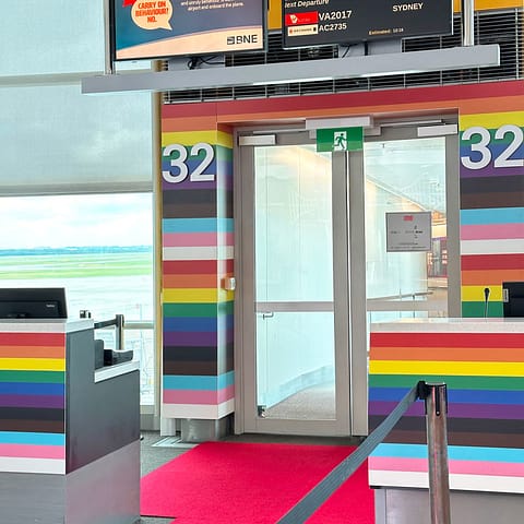 Direct printed PVC panels were printed and installed by Ziggi's Print & Signs, to wrap the gate entrance for the Pride Flight